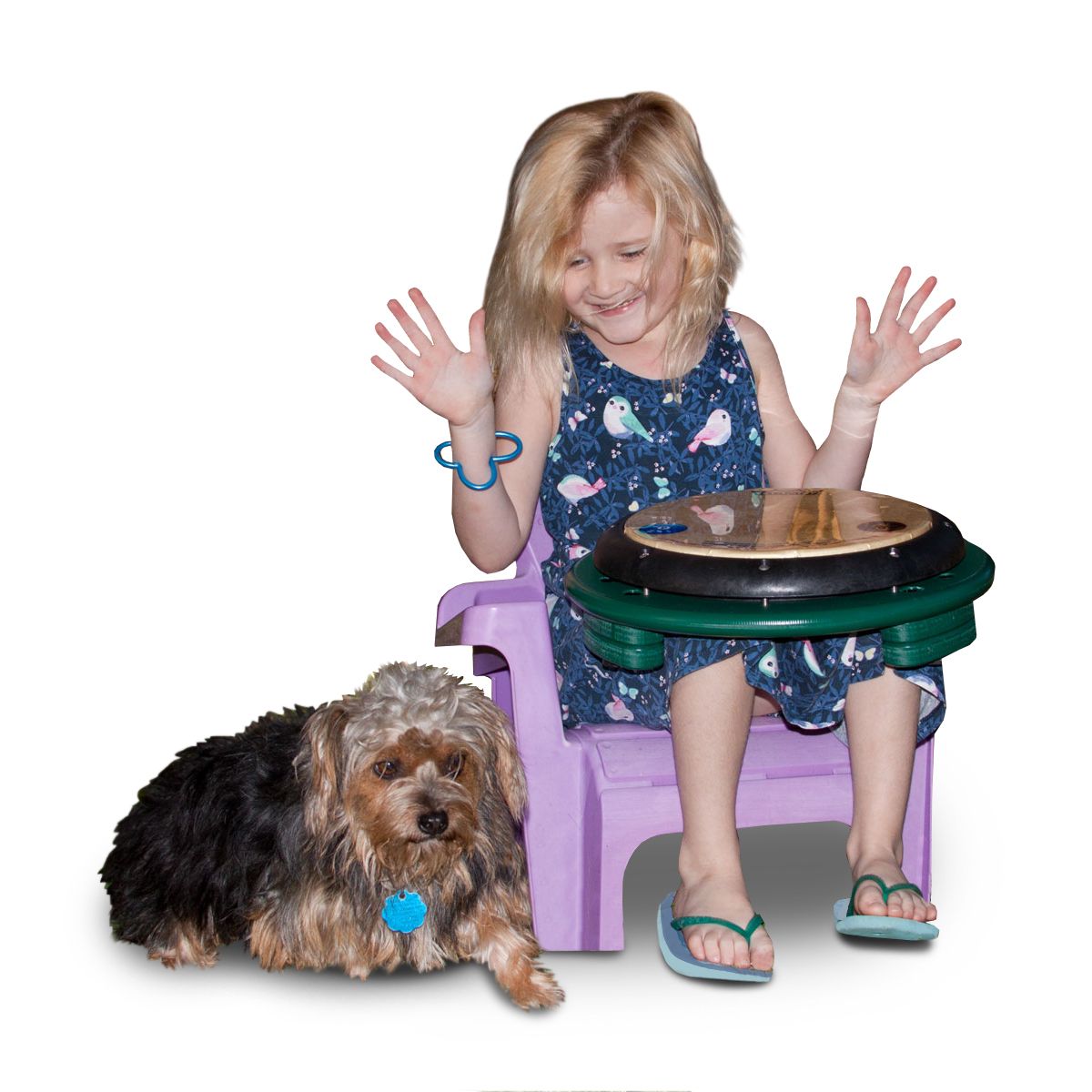 Child Playing the Drum